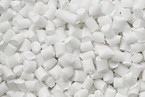 A close up of a pile a white pellets