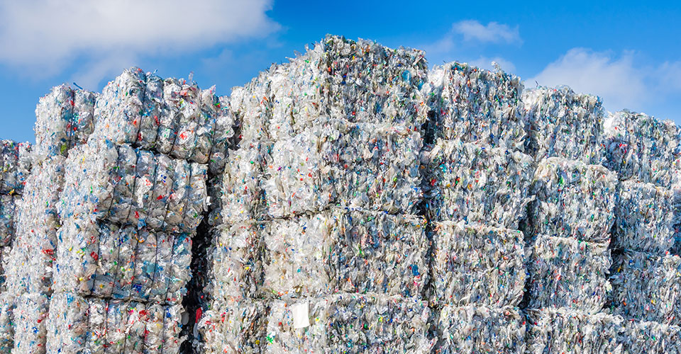 Plastics recycling centers and raw material