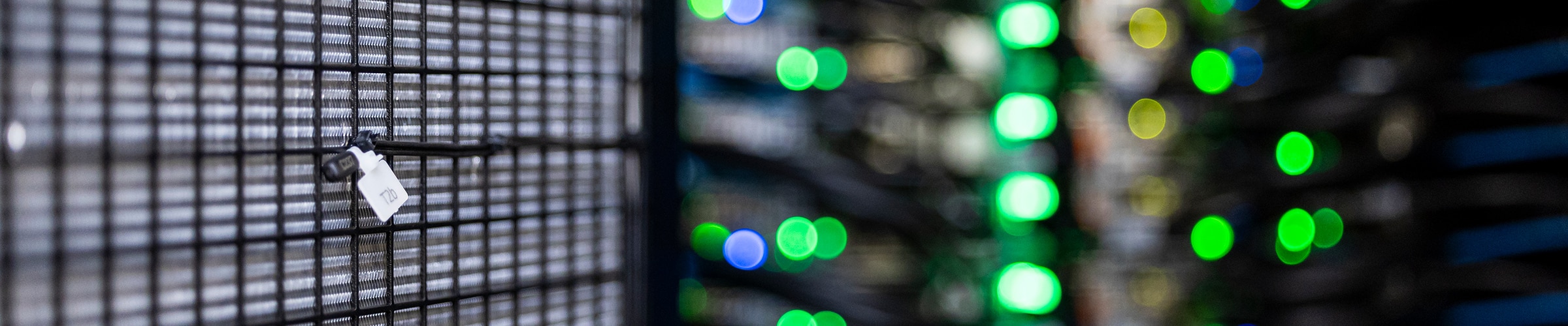 Cooling area of server with lights in the background Cooling area of server with lights in the background