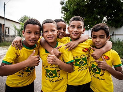 Four kids in yellow shirts Four kids in yellow shirts
