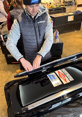 Team USA Luge technician working on a sled Team USA Luge technician working on a sled