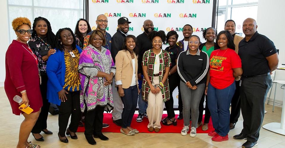 Members of GAAN smile for the camera at a network event