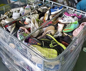 Bin full of recycled running shoes