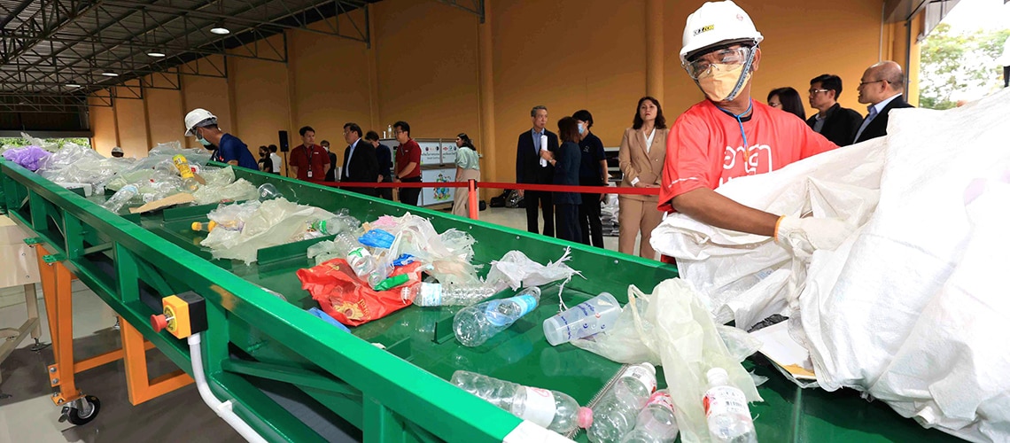 material being loaded into the recycling equipment