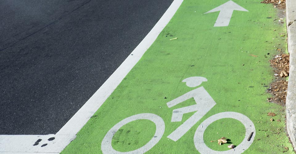 A biker uses the green painted bike lane in Philadelphia