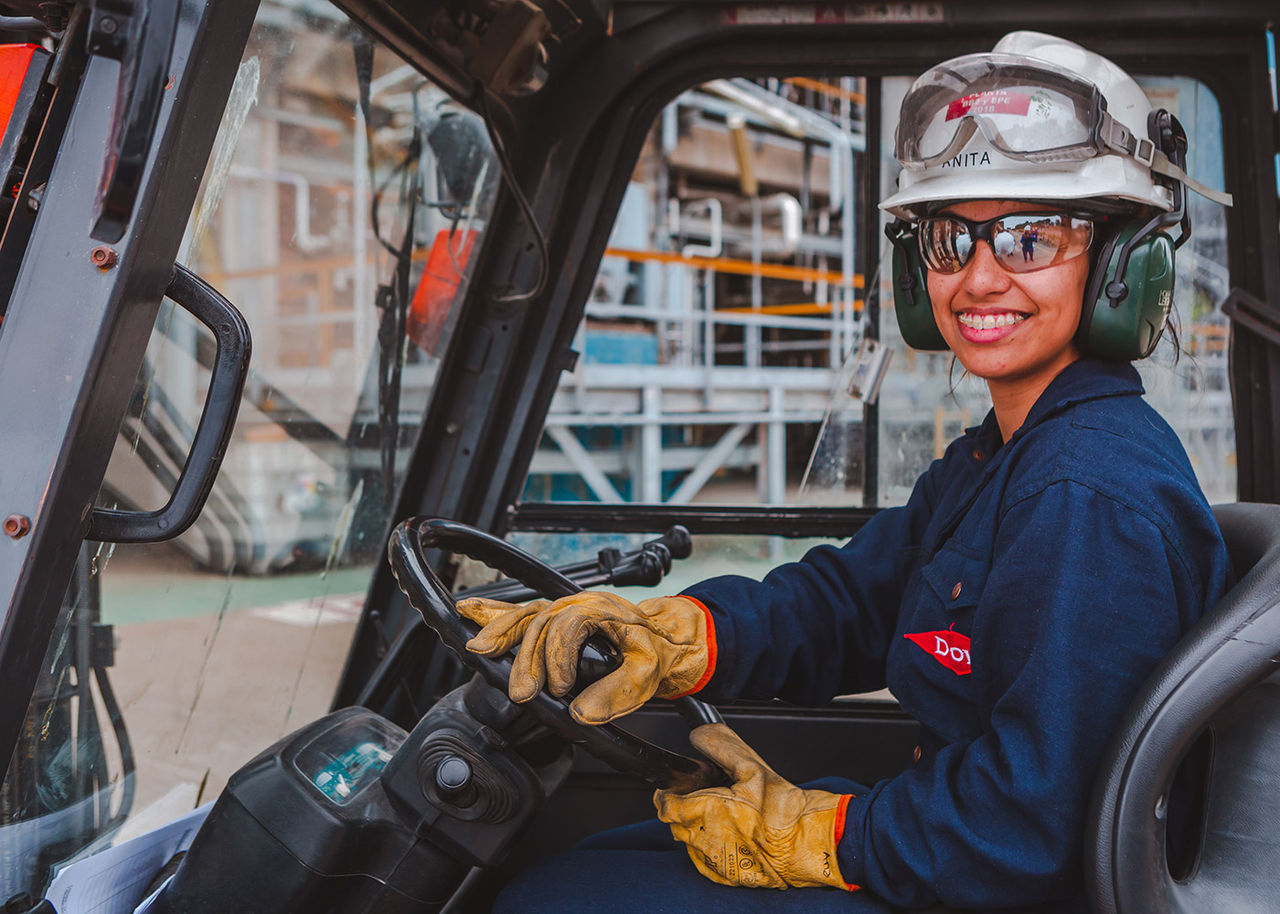 Dow employee driving a forklift