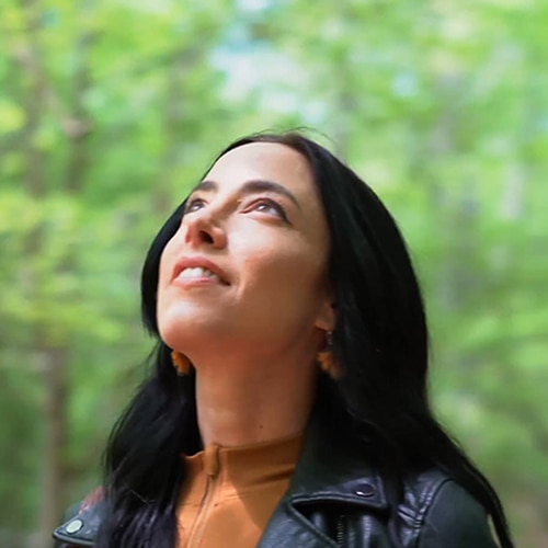 woman looking to the sky