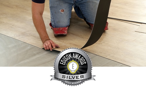flooring with silver badge