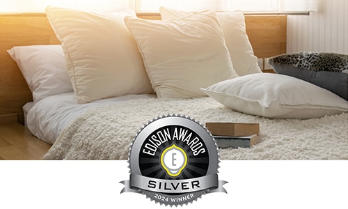 mattress with silver badge