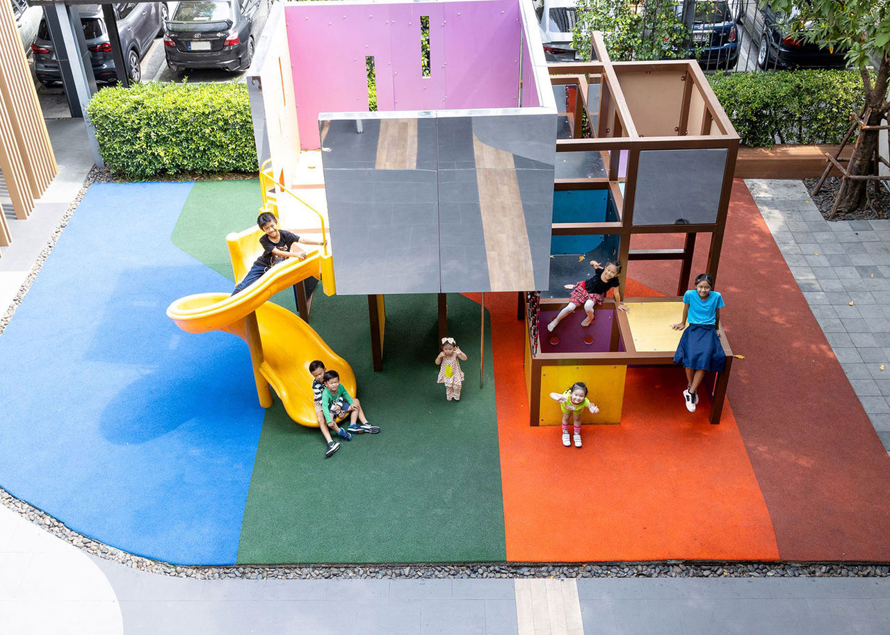 children playing on a colorful playground