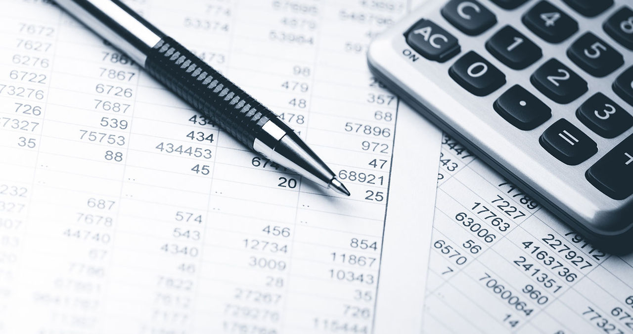 Pen calculator and balance sheets