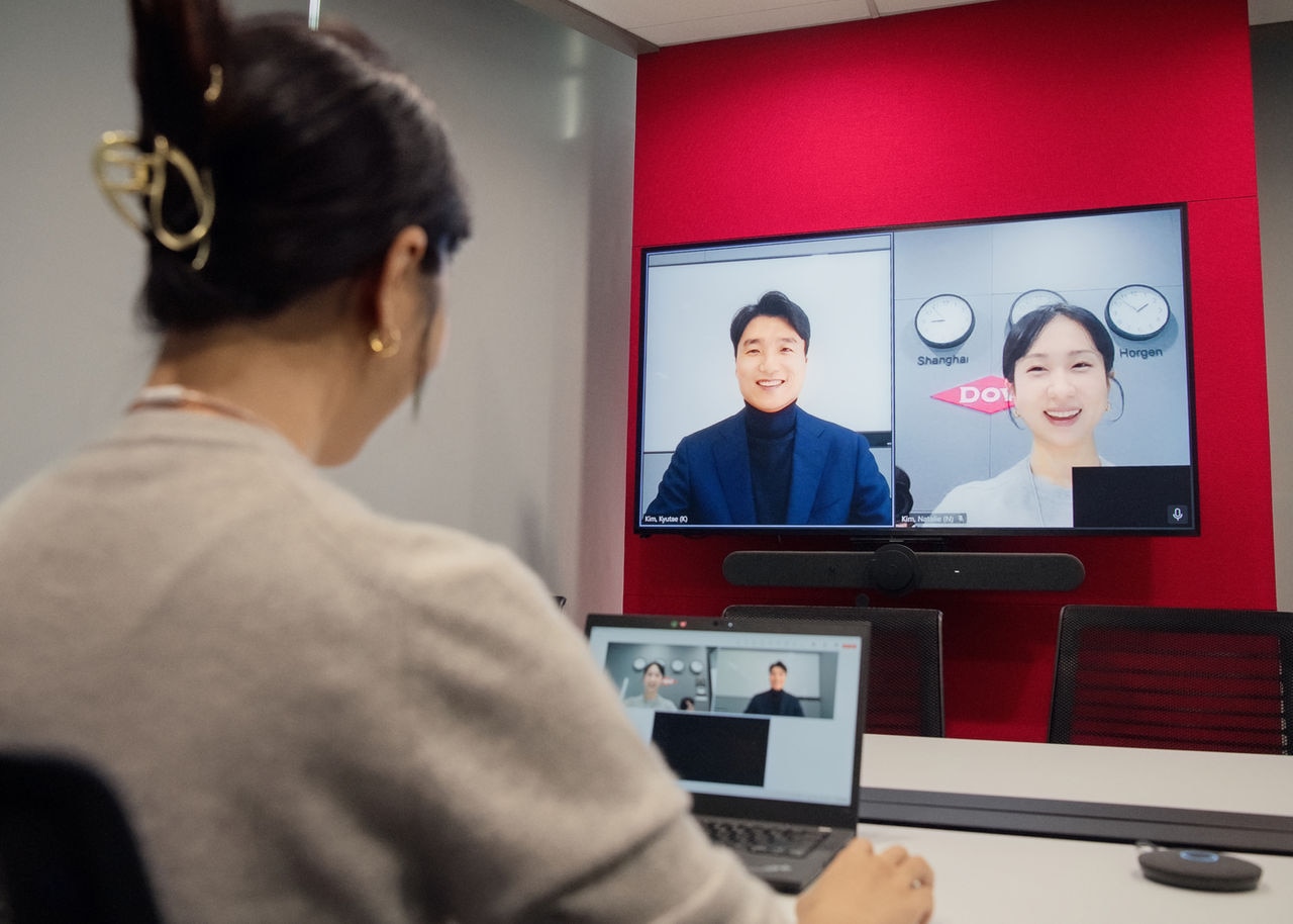 A hand writing on paper