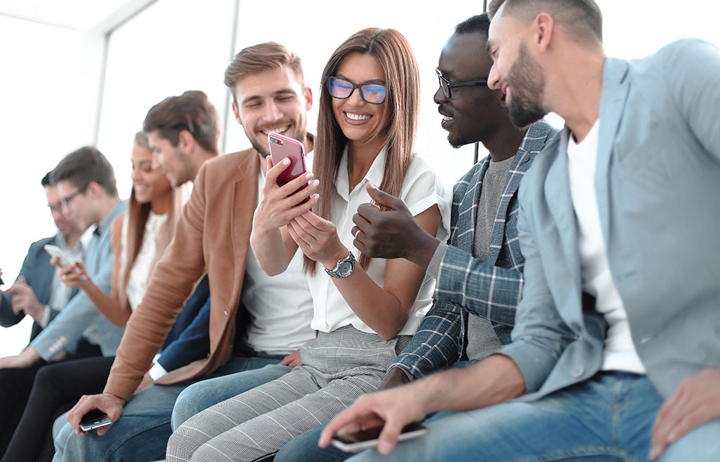 group of people with smartphones