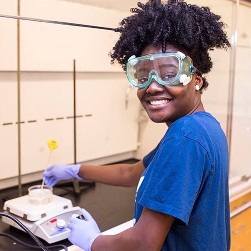 Beyond Benign participant working in the lab