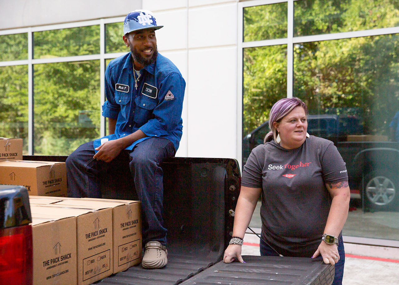 Dow volunteers loading a truck