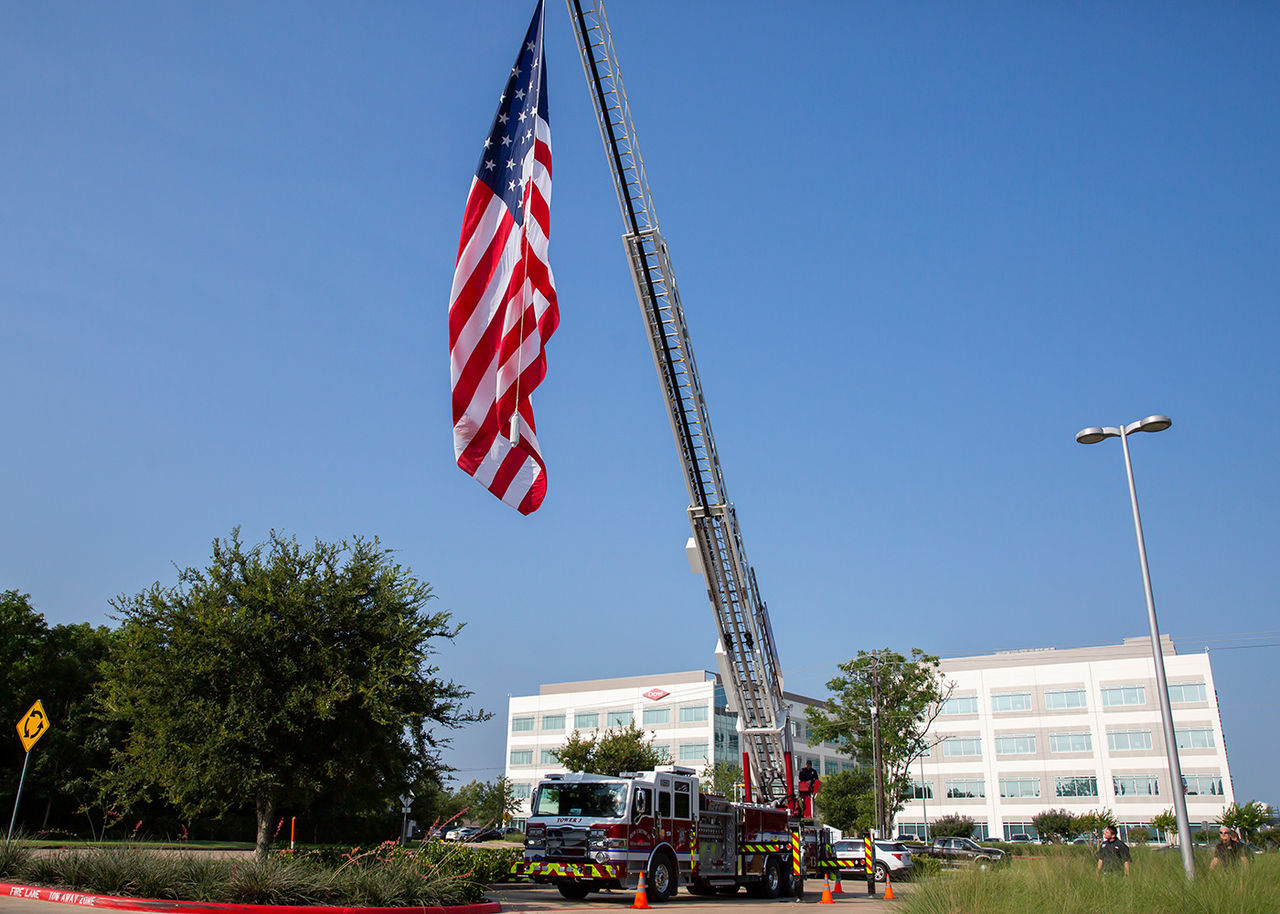 Texas Operations' fire truck hoisting the America flag