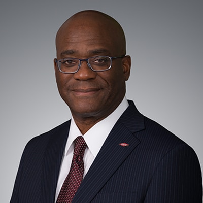 A portrait of John Sampson