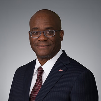 A portrait of John Sampson