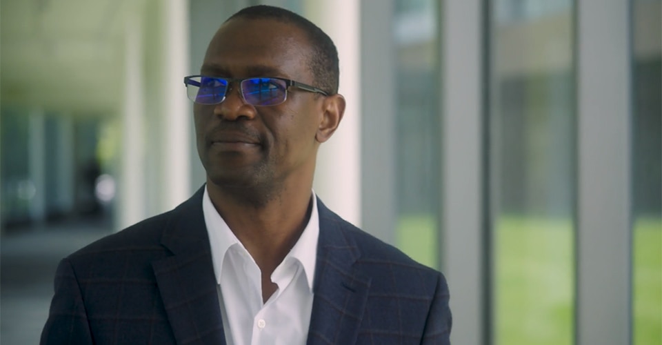 Ademola Idowu smiles at the camera