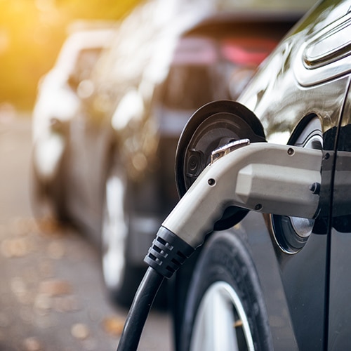 charger plugged into electric vehicle