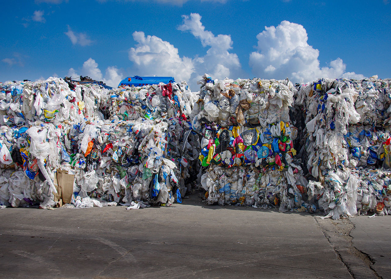 stacks of bundled plastics ready for recycling