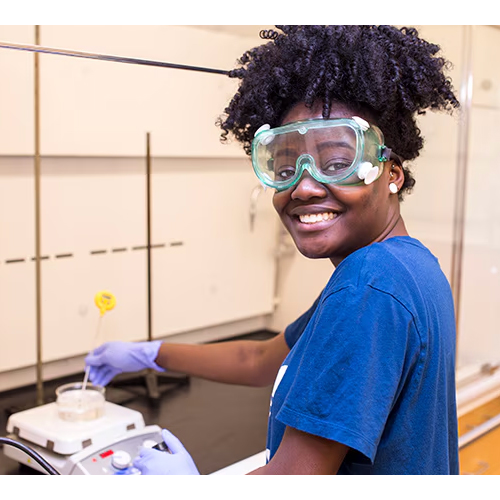 Beyond Benign participant working in the lab