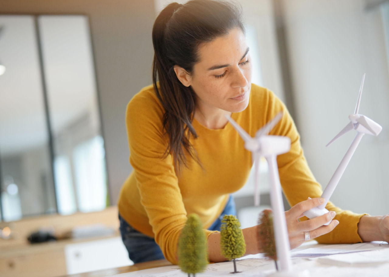 woman with wind mill models