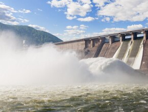 Water flows through a hydroelectric dam