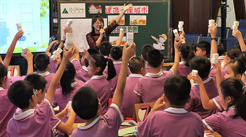 Students in China take part in the Our City program as part of Dow's partnership with Junior Achievement